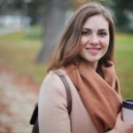Woman Holding Disposable Cup